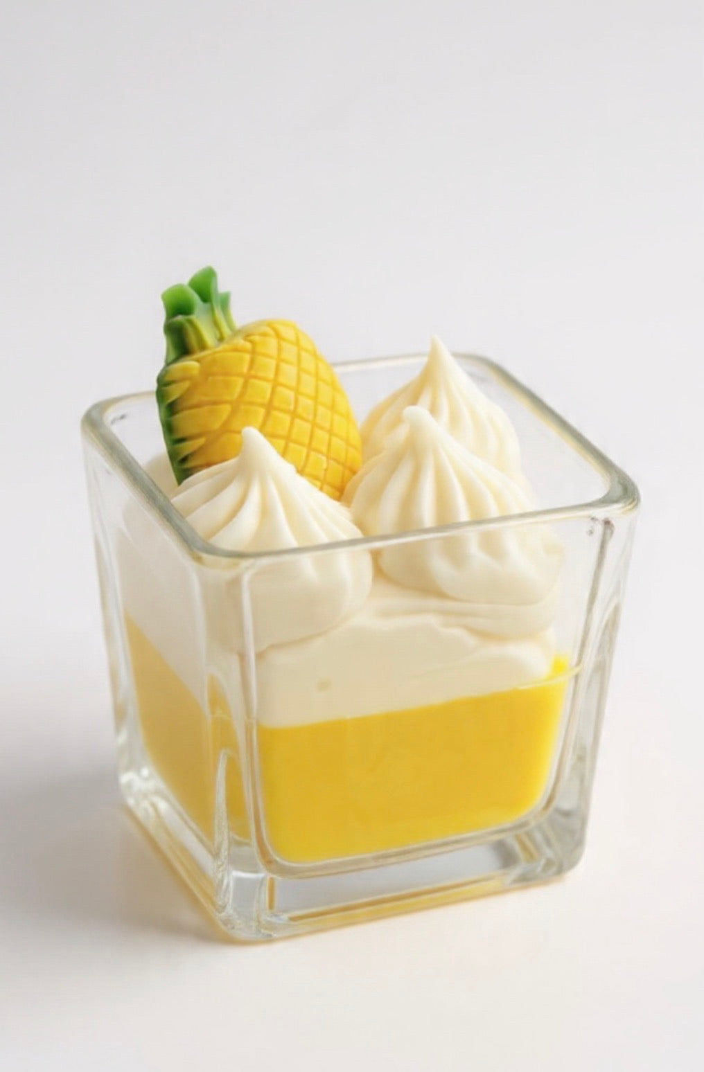 Pineapple Paradise Candle close-up showing whipped wax and pineapple charm