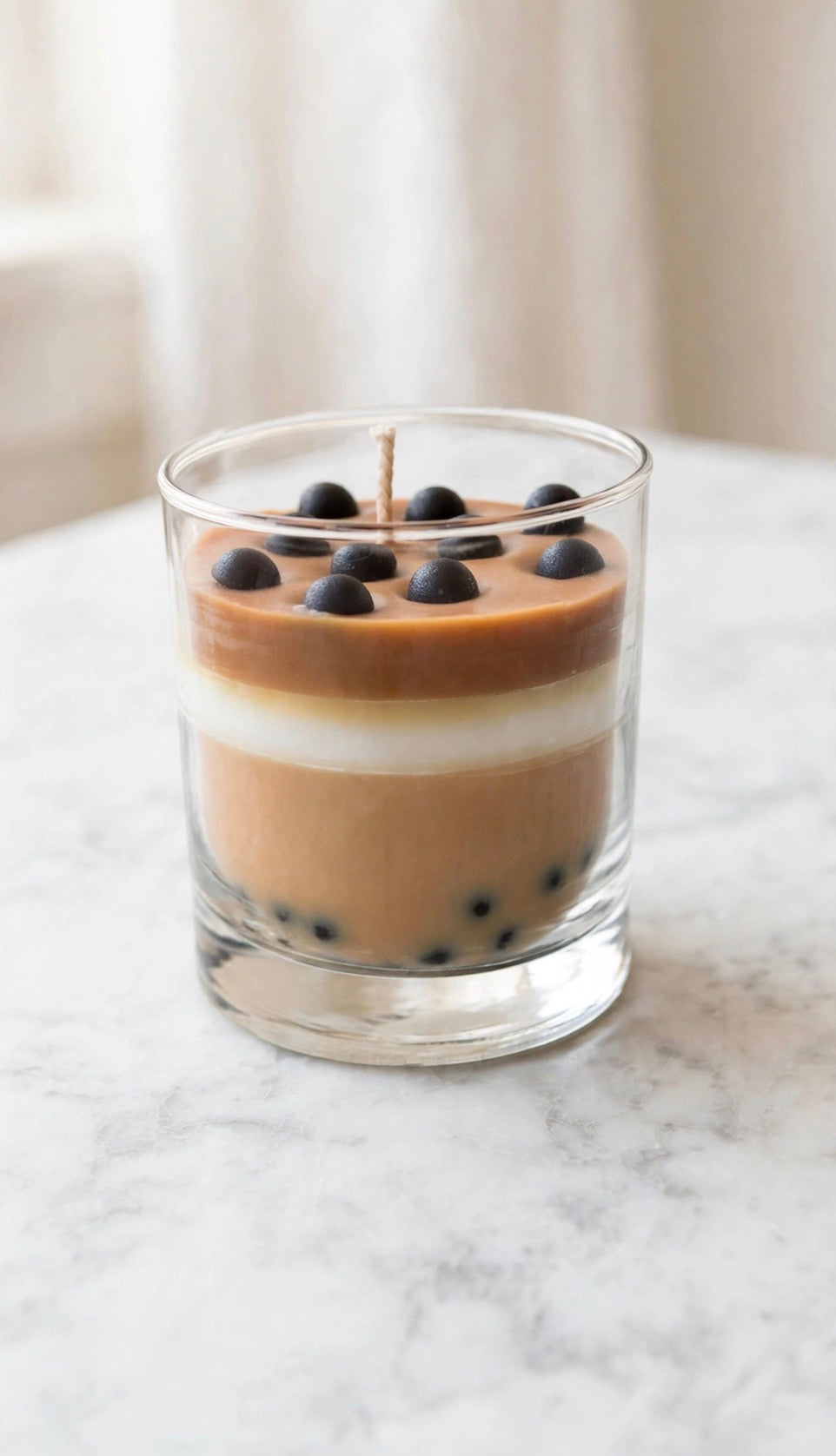 Boba Milk Tea Candle on marble surface