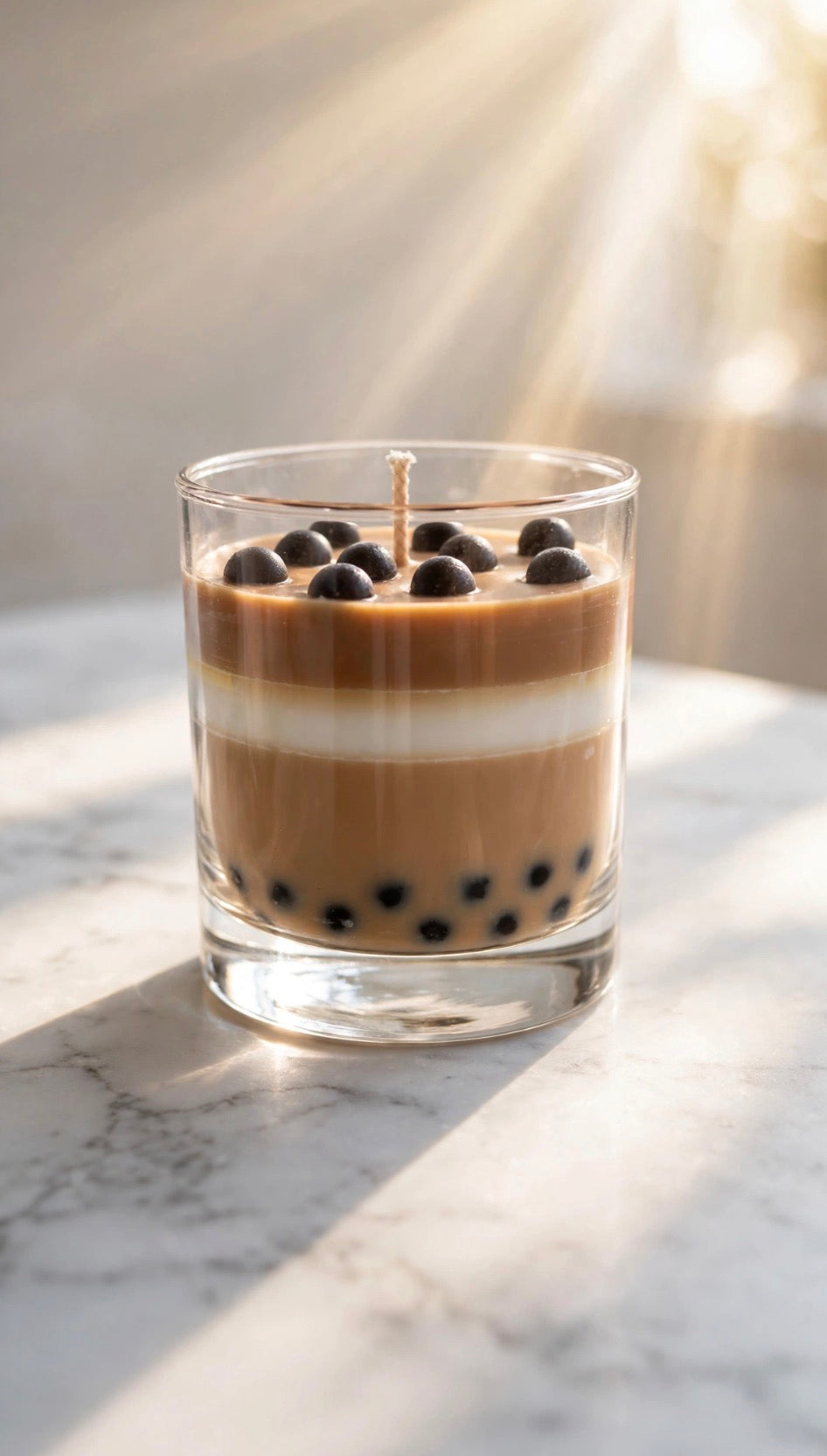 Boba Milk Tea Candle in sunlight on marble surface